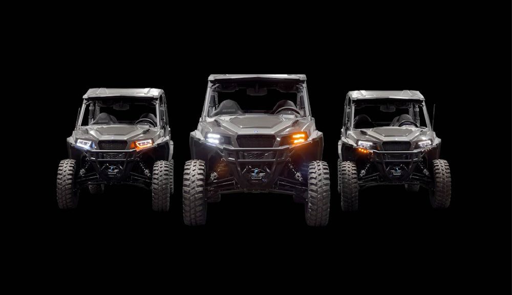 Three Polaris Generals running WD turn signal kits