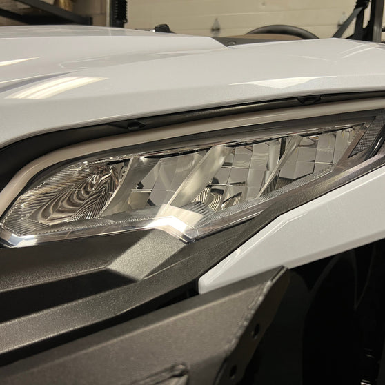 Street legal kit installed on 2024+ Kawasaki Ridge showing front turn signal placement