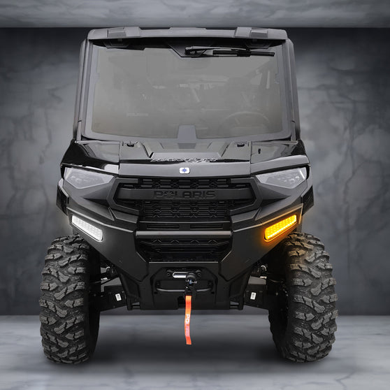 2025+ Polaris Ranger XP 1000 Northstar auxiliary light shown as daytime running light mounted in factory bumper cut-out