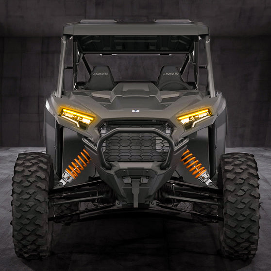 Sequential LED turn signal strips illuminated amber on 2024+ Polaris RZR XP 1000 front end
