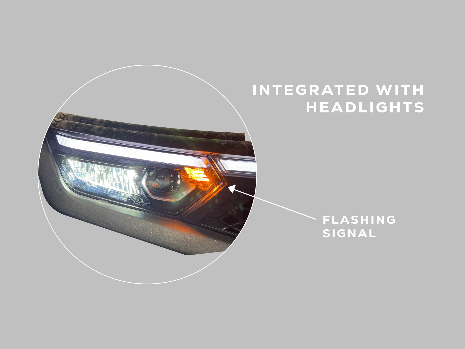 Close-up of the factory headlight unit with integrated turn signal function and wiring connector
