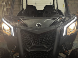 Front view of 2018+ Can Am Maverick X3 with signature replacement headlights and turn signals